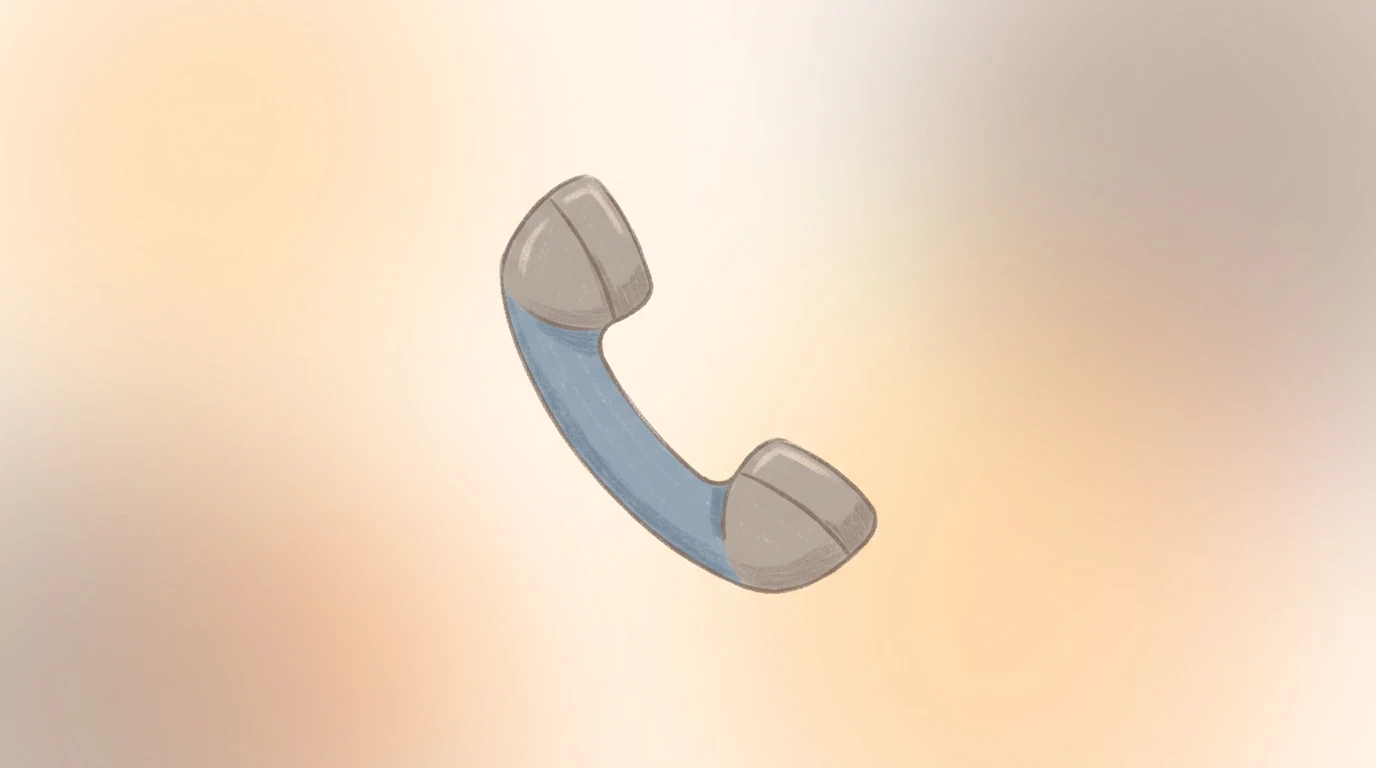 Telefonhörer-Symbol vor einem ruhigen, warmen Hintergrund als Sinnbild eines Beratungsgesprächs